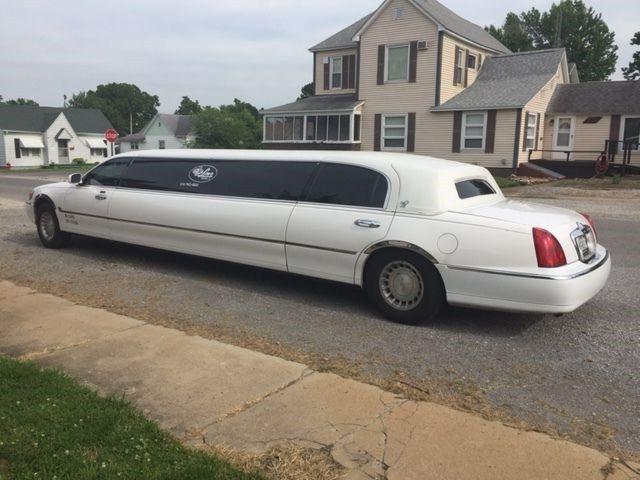 Tinted windows 2000 Lincoln Town Car limousine