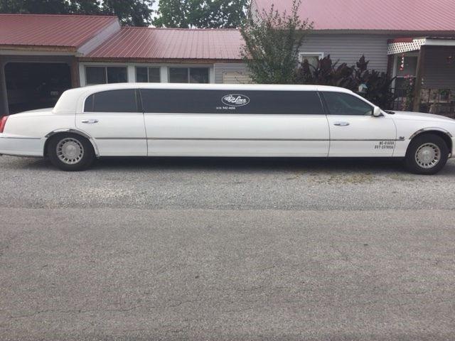Tinted windows 2000 Lincoln Town Car limousine